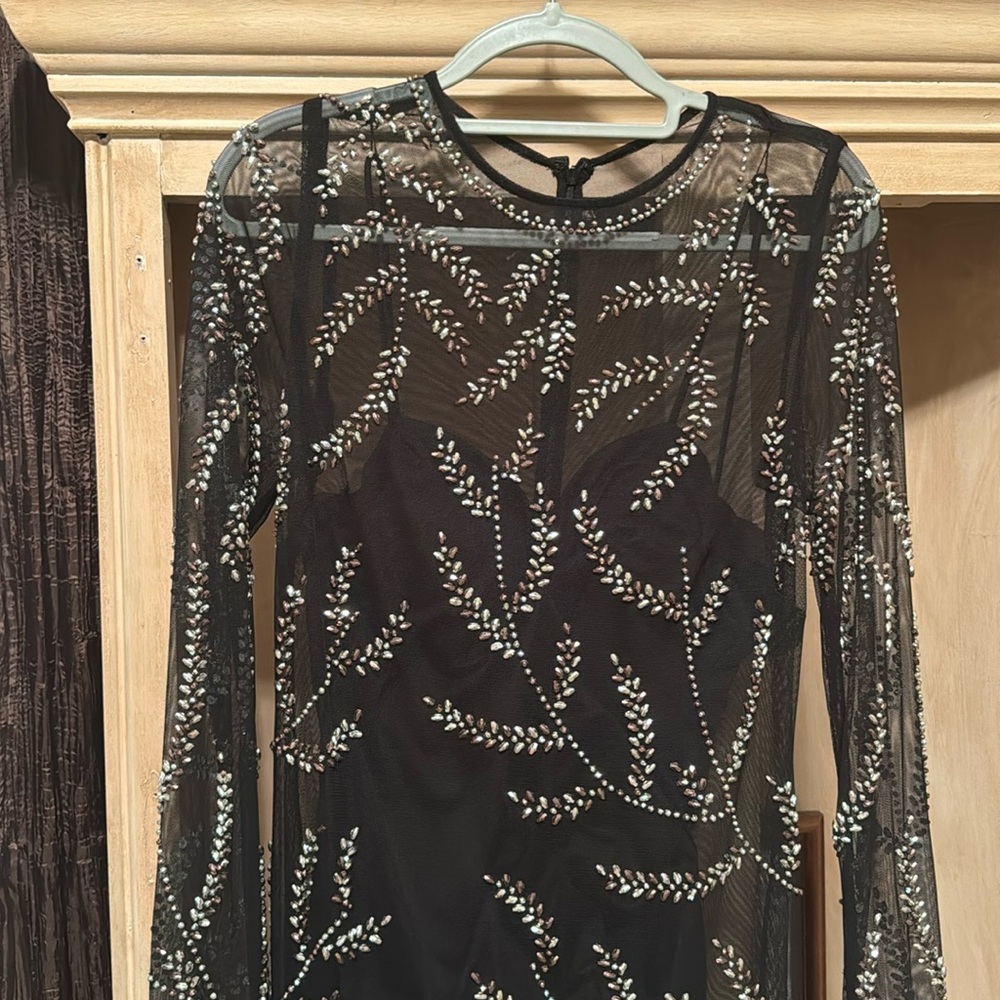 One of a kind absolutely gorgeous on worn once size 12. You will turn heads